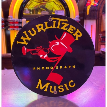 Round Wurlitzer Music enamel sign made of enameled steel featuring the iconic Wurlitzer logo. Diameter 22.5 cm.